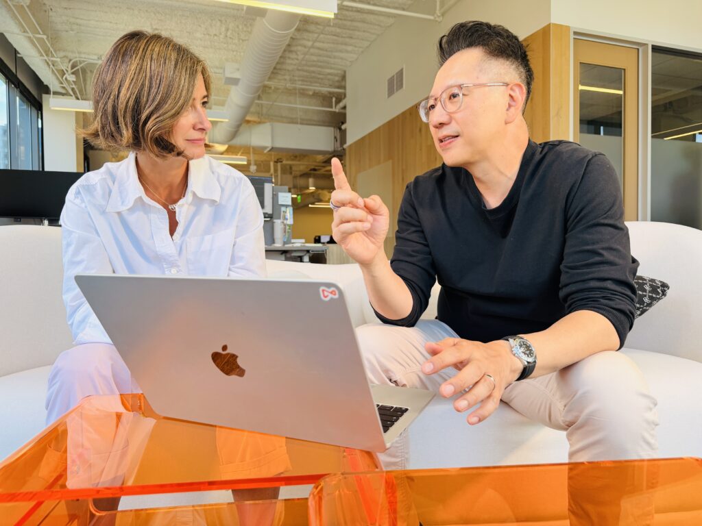 Dan Kim collaborating with sales at Airwallex
